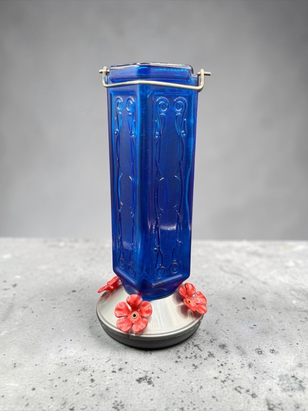 COBALT BLUE GLASS HUMMINGBIRD FEEDER WITH METAL BASE
